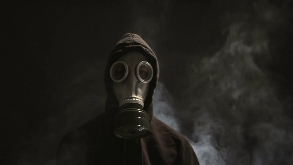 Man In Gas Mask With Smoke Rising Qkslbauc F0000 1024X576 